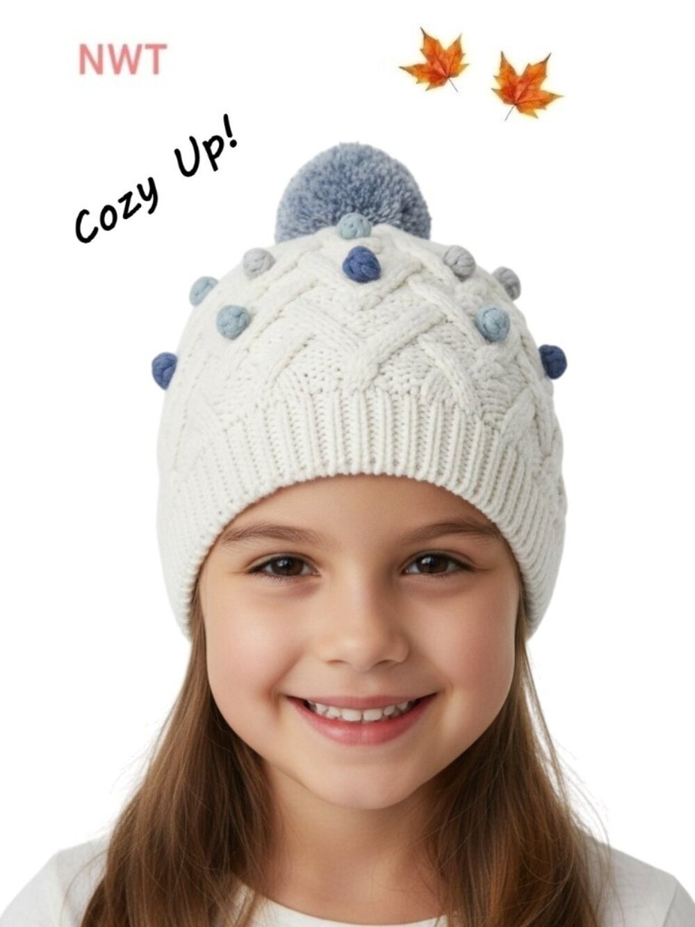 Vignette Cream Knit Beanie features adorable blue & gray pompoms